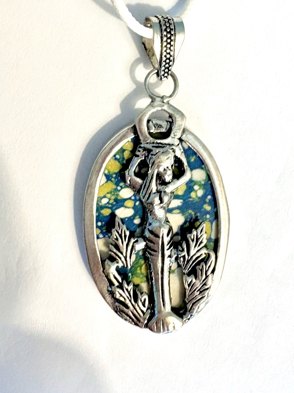 2 1/2 inch, Mosaic Jasper pendant, silver Mermaid, and a white leather cord.